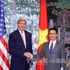 越南政府副总理武德儋会见美国国务卿约翰·克里（图源：越通社）