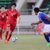 越南U19队（红衣）战平马来西亚队（图：体育报）
