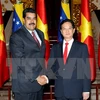 越南政府总理阮晋勇和委内瑞拉总统尼古拉斯•马杜罗（图片来源：越通社）