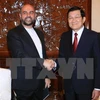 越南国家主席张晋创会见伊朗驻越南大使侯赛因·贝希讷。