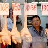 中国一家卖家禽的商店（图片来源：越通社）