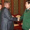 冯光清大将会见南非国防部国务秘书古录杯阿博士​ （图片来源于网络）