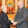 白俄罗斯总统亚历山大·卢卡申科和越共中央总书记阮富仲（图片来源：越通社）