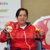越南残疾举重队的邓氏玲凤（图片来源：vietnam+)
