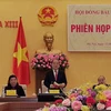 越南国会主席、国家选举委员会主席阮生雄主持会议。