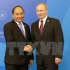 越南政府总理阮春福和俄罗斯总统普京（图片来源：越通社）