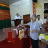 清化省选民参加新一届国会和各级人民议会换届选举投票（图片来源：越通社）