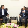 越南政府副总理王廷惠与澳大利亚联邦银行总裁伊恩•纳瑞夫。