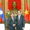 越南国家主席陈大光会见老挝外交部长沙伦赛·贡玛希。（图片来源：越通社）