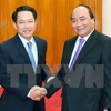 越南政府总理阮春福会见老挝外长（图片来源：越通社）