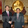 越南国家主席陈大光与老挝人民革命党中央总书记、国家主席本扬·沃拉吉。（图片来源：越通社）