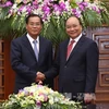越南政府总理会见老挝计划投资部部长（图片来源：越通社）