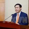 越南政府副总理王廷惠被任命为国家财政货币政策咨询委员会主席。
