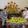 胡志明市人民议会主席阮氏决心会见老挝建国阵线万象委员会主席波翁替营•筐斯（图片来源：越通社）