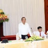 越南政府副总理张和平会见同塔省革命有功者代表团（图片来源：越通社）