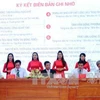 东潮县签署7个投资单位的10个合作投资项目备忘录（图片来源：越通社）