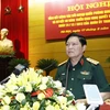 国防部部长吴春历在会议上发表讲话（图片来源：越通社） 