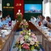越南广南省劳动联合会与老挝占巴塞省工会联合会签署合作备忘录（图片来源：越通社）