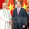国家主席陈大光​与印度总理莫迪 亲切握手（图片来源：越通社）