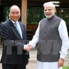 越南政府副总理阮春福和印度总理纳伦德拉·莫迪（图片来源：越通社）