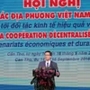 越南政府副总理武德儋在会上致辞。
