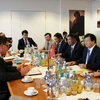 越南政府副总理郑廷勇同德国经济合作与发展部领导举行工作会谈
