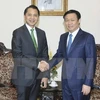 越南政府副总理王廷惠会见泰国开泰银行行长