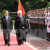 越南国家主席陈大光和伊朗总统哈桑·鲁哈尼（图片来源：越通社）