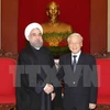 越共中央总书记阮富仲会见伊朗总统哈桑•鲁哈尼。