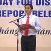 越南红十字会中央委员会副总书记邓明进在集会上致辞