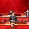 下午，越共中央政治局委员、国家主席张晋创代表主席团主持会议。