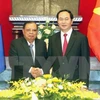 越南国家主席陈大光与老挝人民革命党中央委员会总书记、国家主席本扬•沃拉吉