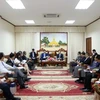 老挝政府副总理宋迪•隆迪会见越南工商部高级代表团