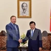郑廷勇副总理与俄罗斯扎鲁别日石油公司总经理库德里亚绍夫