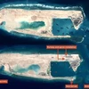 今年2月份卫星图像显示中国在越南长沙群岛的十字礁上非法建设飞机跑道。（图片来源：IHS Jane's Defense Weekly）