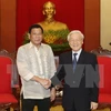 越共中央总书记阮富仲会见菲律宾总统杜特尔特。（图片来源：越通社）