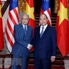 越南政府总理阮春福与马来西亚总理举行会谈 