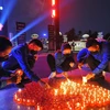 越南全国各地悼念在新冠疫情防控中牺牲人员和逝世同胞