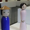 来越南妇女博物馆欣赏穿着越南奥黛和三婆衫的日本人偶