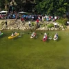 陀江上皮划艇比赛--和平省旅游业新亮点