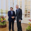 越南政府总理范明政与新加坡总理李显龙举行会谈
