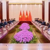 越南政府总理范明政同中国国务院总理李强会谈