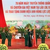 援老越南志愿军和专家传统日70周年纪念活动在河内隆重举行