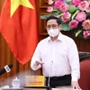 越南政府总理范明政：研究建立新冠疫苗基金