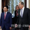 越南政府副总理兼外交部部长范平明会见了俄罗斯外交部部长拉夫罗夫（图片来源：越通社）