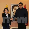 越南国会主席阮氏金银会见委内瑞拉总统尼古拉斯·马杜罗（图片来源：越通社）