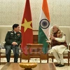 越共中央政治局委员、国防部部长吴春历大将与印度总理纳伦德拉•莫迪