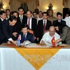 越南最高人民检察院检察长黎明智与古巴总检察院总检察长达里奥·德尔加多·古拉签署合作协议