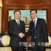 胡志明市人民议会副主席范德海​与中国大连市人民代表大会常务委员会主任里景瑞