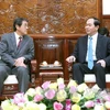 越南国家主席陈大光会见日本驻越大使梅田邦夫（图片来源：越通社）
